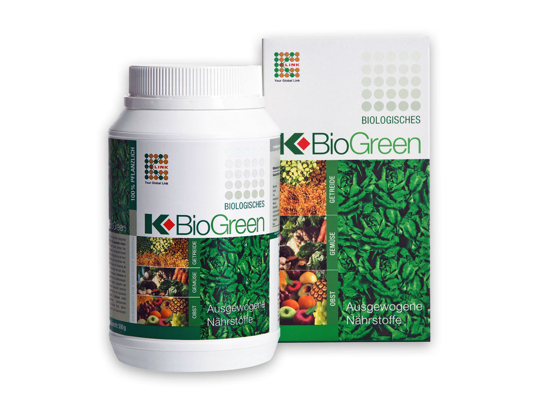 A white plastic bottle and matching product box for K BioGreen, a German organic multivitamin supplement, shown on a plain white background.