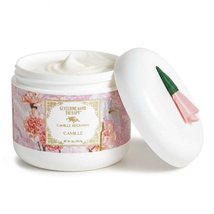 Jar of Camille Beckman Glycerine Hand Therapy with floral design on a white background