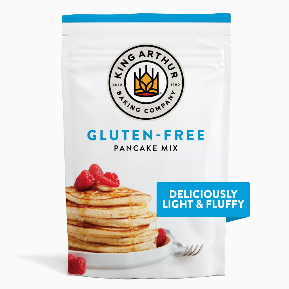 King Arthur Baking Company gluten-free pancake mix package with a stack of pancakes and berries on a white background.