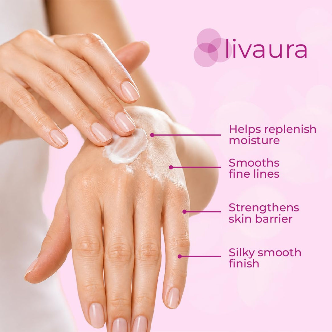 A close-up of a hand applying a white cream to another hand, with text listing benefits: helps replenish moisture, smooths fine lines, strengthens skin barrier, and gives a silky smooth finish. The brand name 'livaura' appears on a pink background.