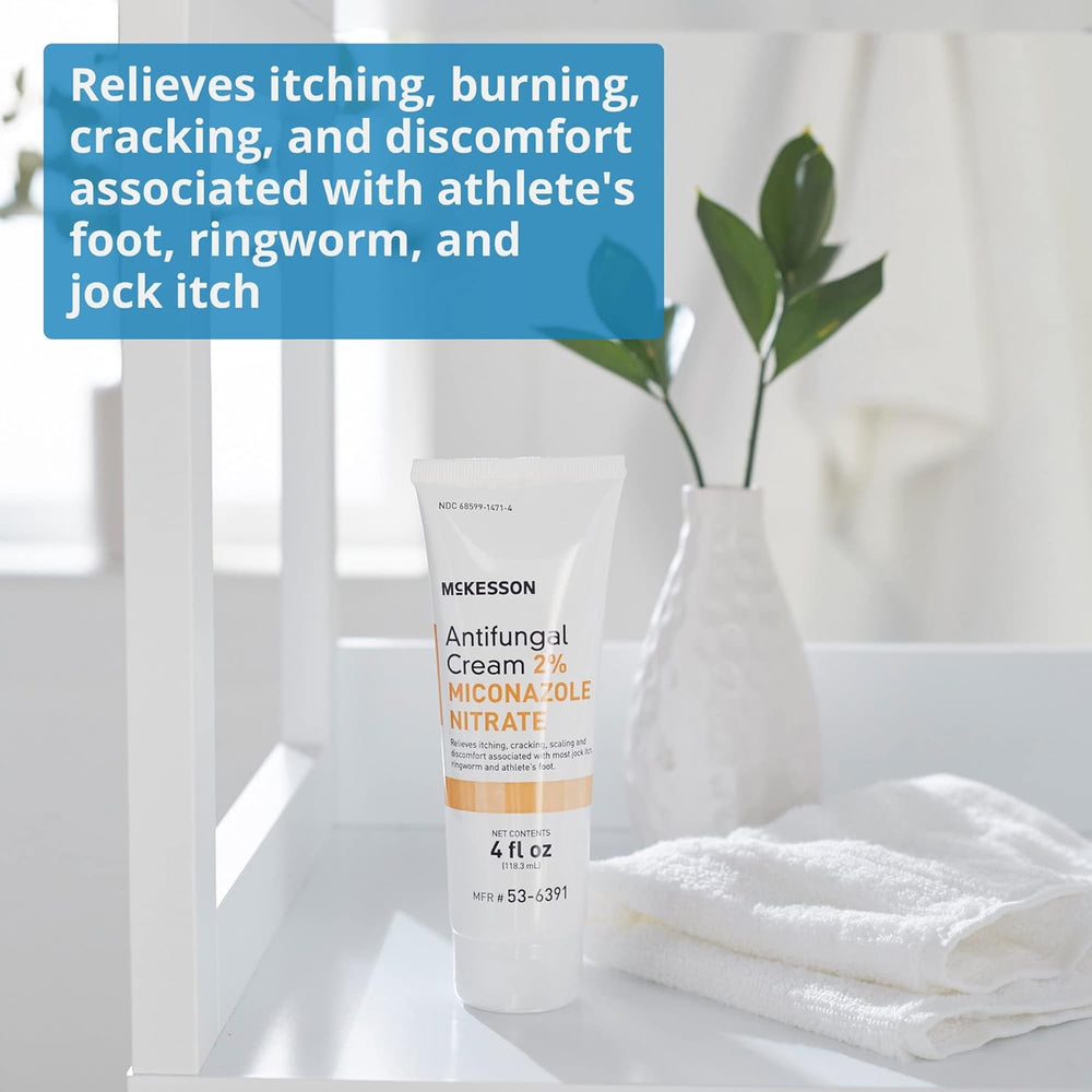 Antifungal cream bottle with text on a white surface