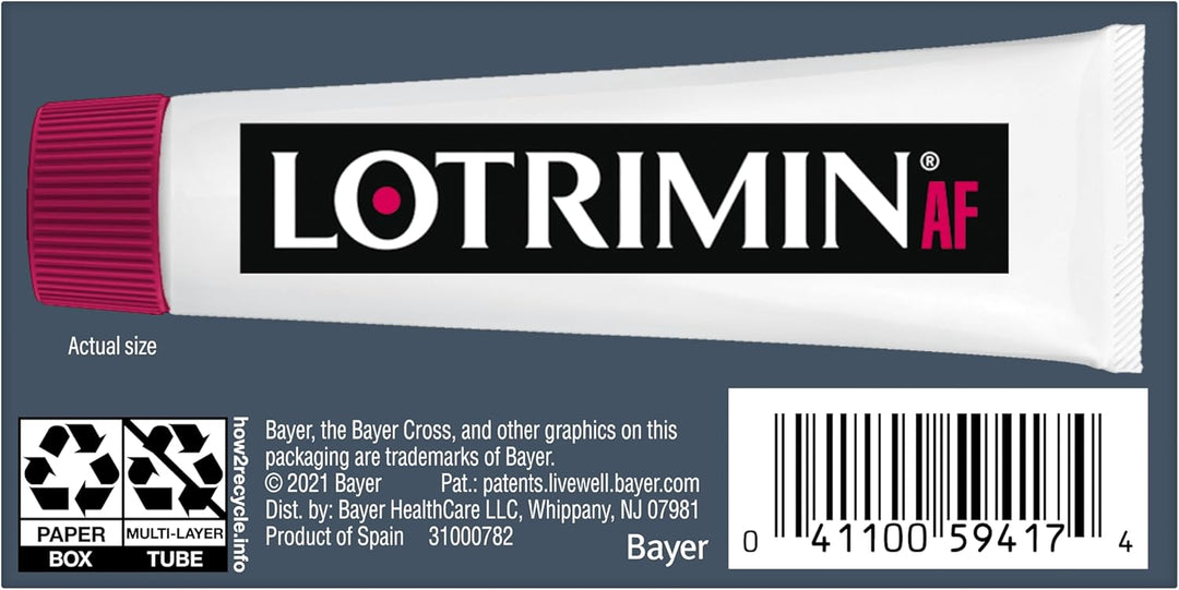 A tube of Lotrimin AF allergy relief medicine shown from the back, featuring a white tube with a magenta cap, a black brand label, and product details including a barcode and recycling icons on a dark gray background.