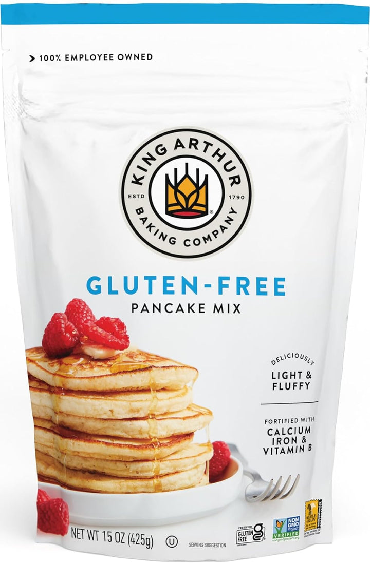 King Arthur Gluten-Free Pancake Mix packaging with a stack of pancakes and berries on a white background.