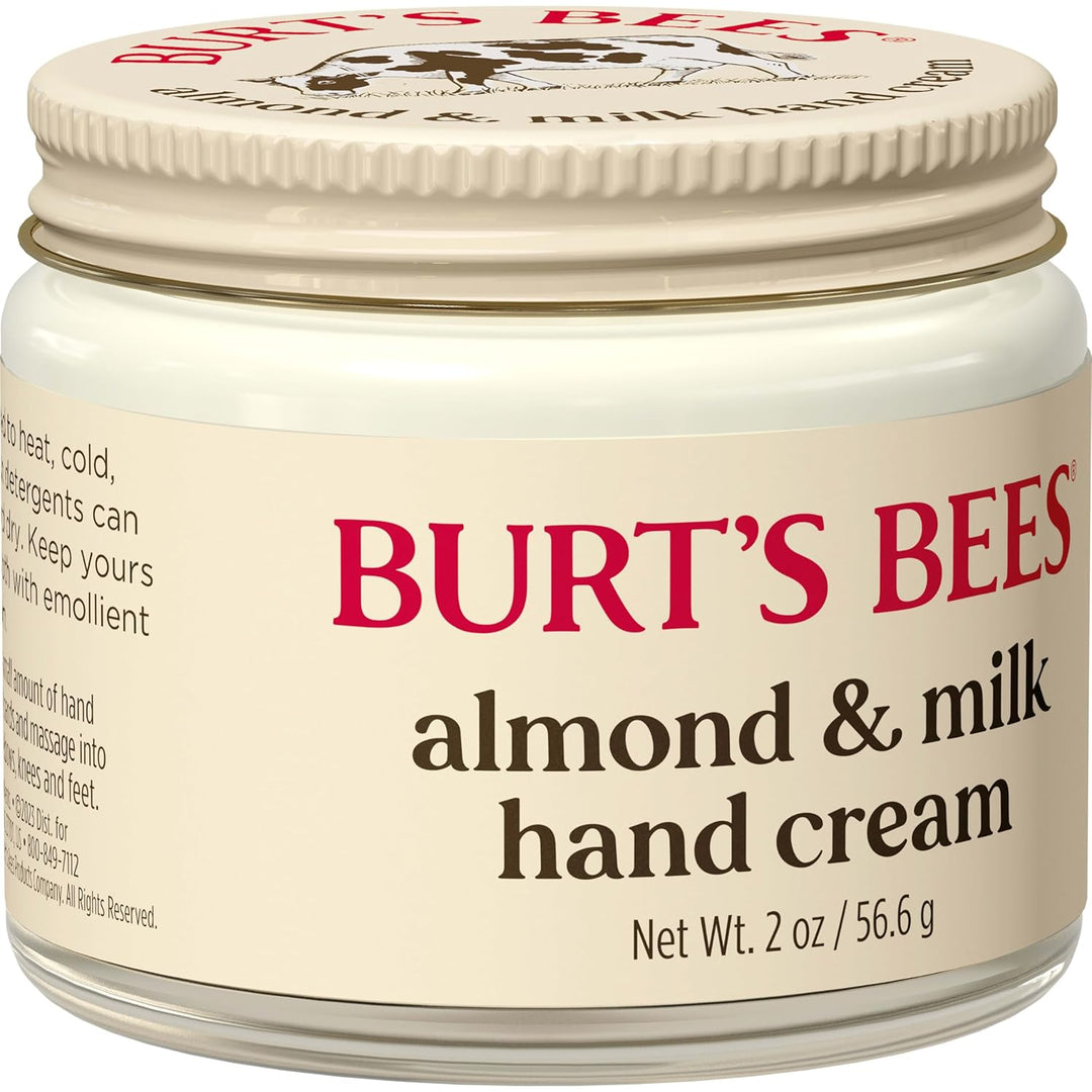 Jar of Burt's Bees almond & milk hand cream on a white background